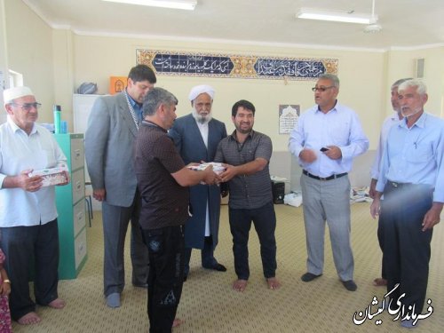 دیدار بخشدار گلدشت با خانواده شهدا